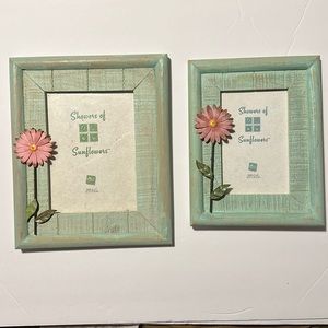 Pair of mint green wood frames with pink metal flowers hold 5x7 & 4x6 photos